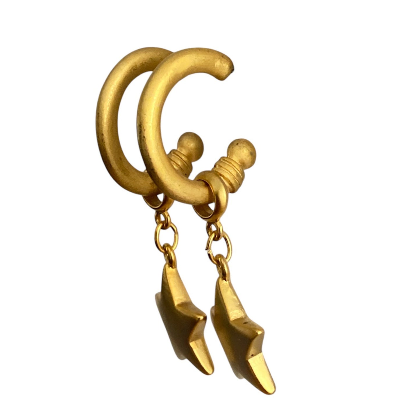 Gullfargede øredobber med hengende stjerner