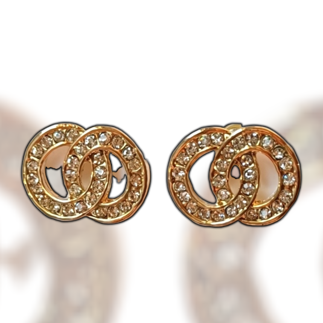 Gullfargede øredobber med doble sirkler og klare krystaller