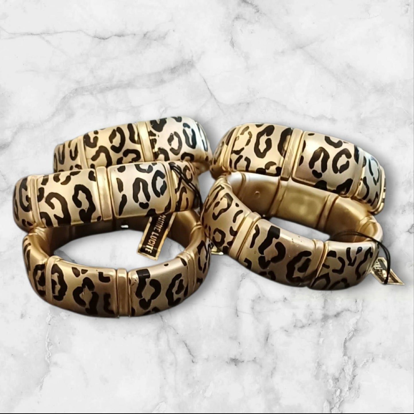 Elastisk gullfarget armbånd med leopardmønster