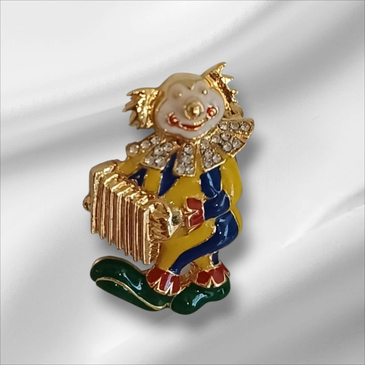 Fargerik vintage klovnebrosje med trekkspill