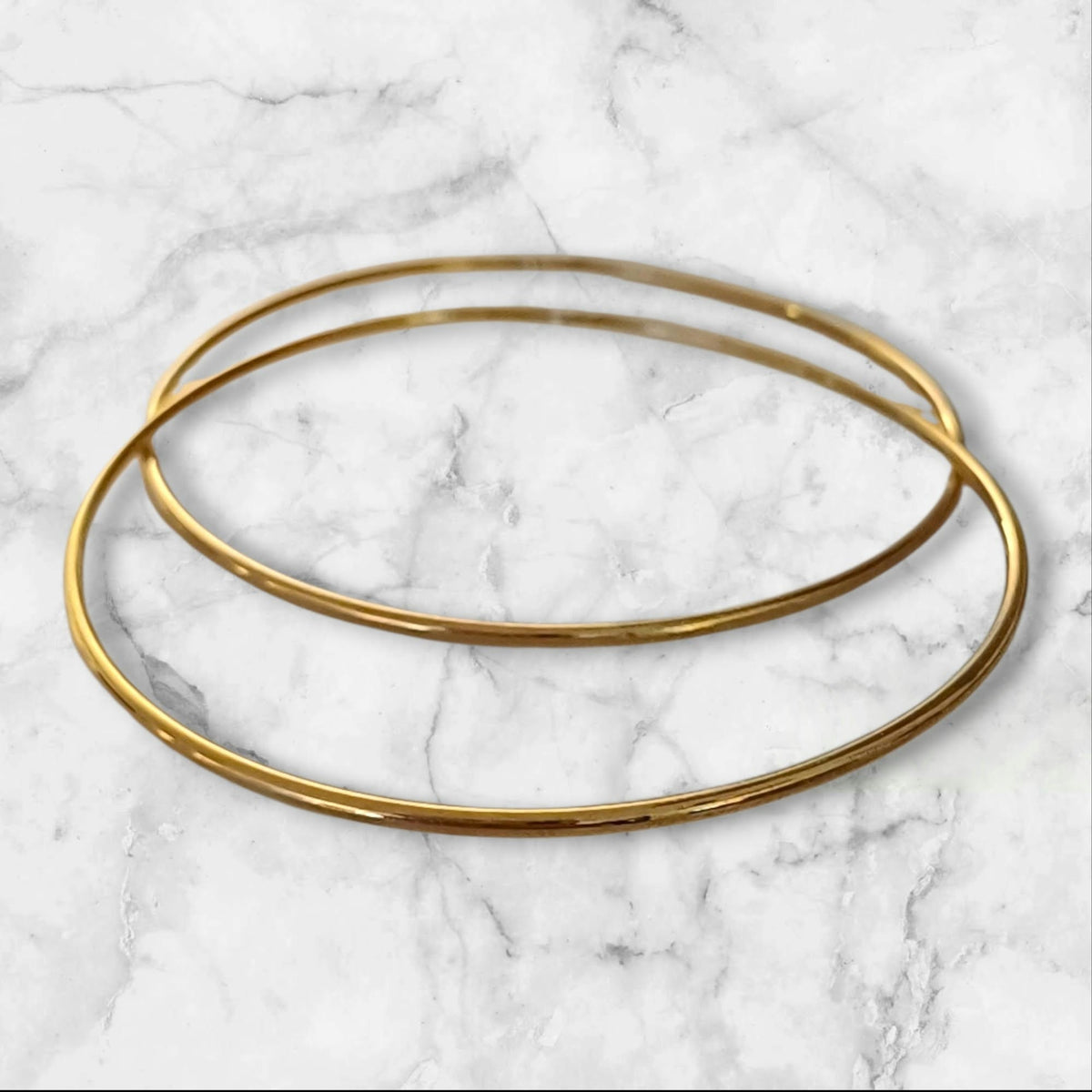 Store tynne gullfargede hoops