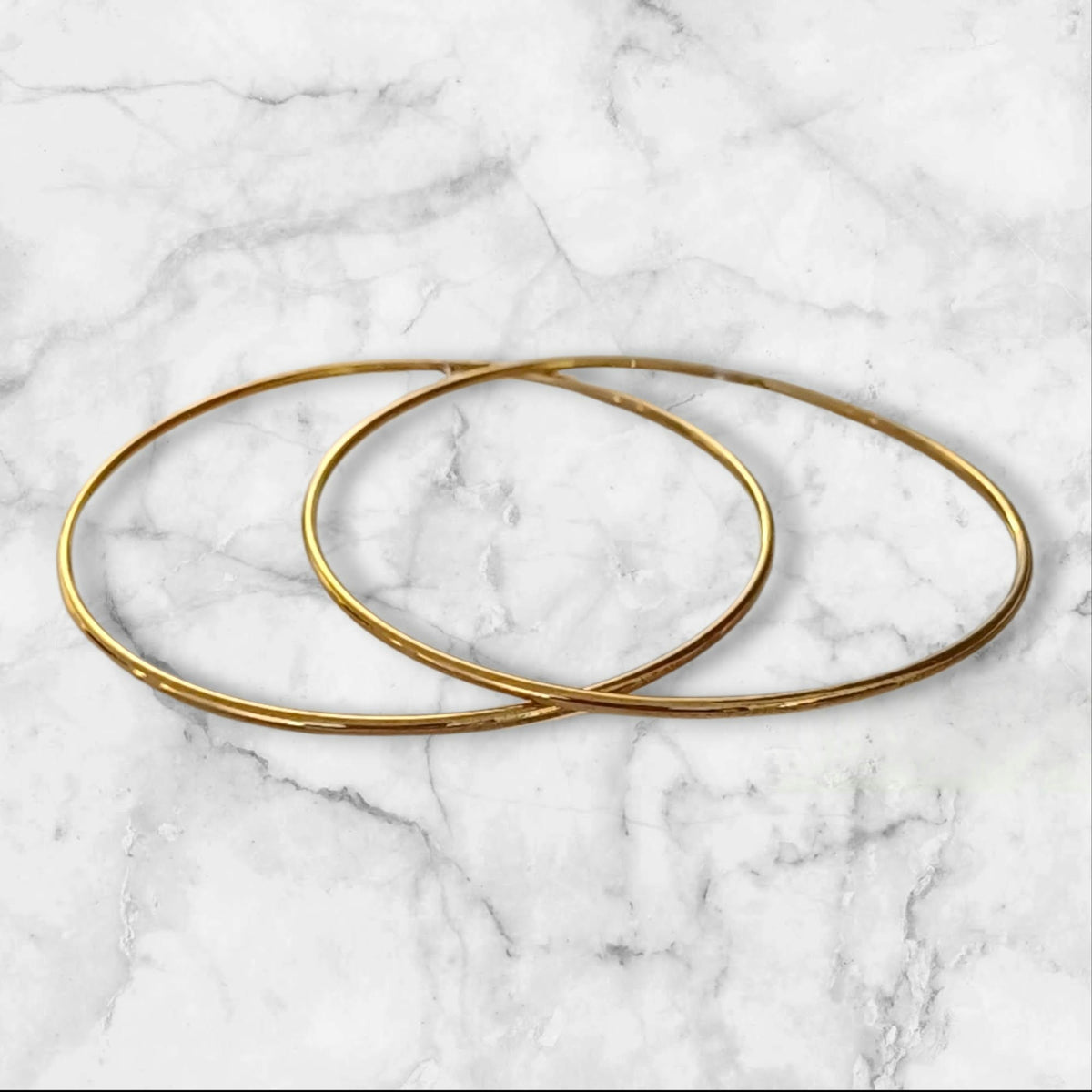 Store tynne gullfargede hoops