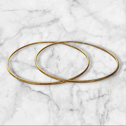 Store tynne gullfargede hoops