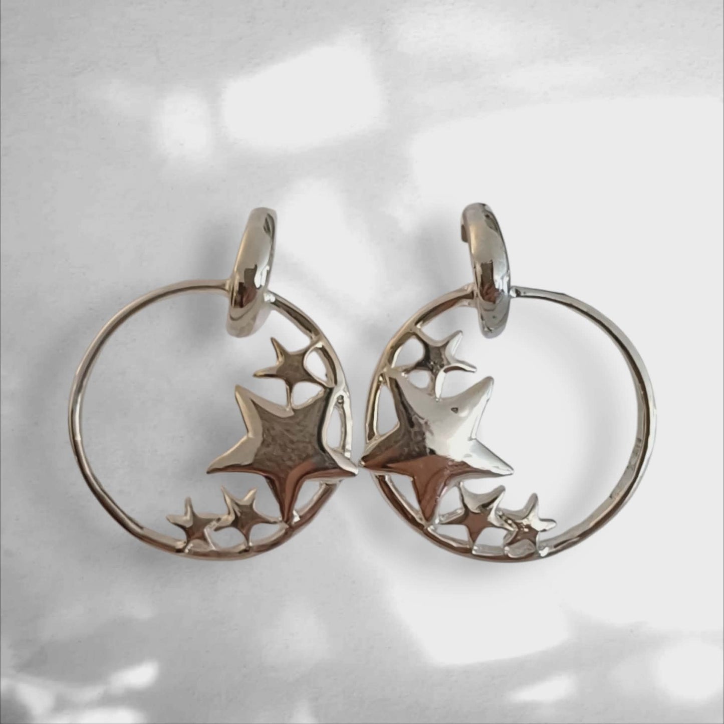 Vintage stjernehoops i sølvfarget metall