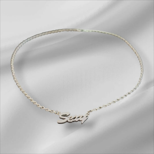 Sølvfarget “Sexy”-halskjede